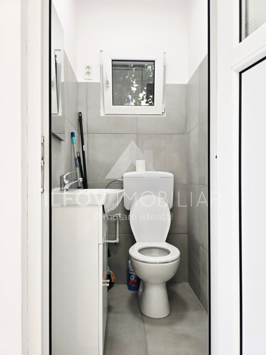Spatiu comercial central Balotesti, 21.3 mp, curte 25mp, complet renovat